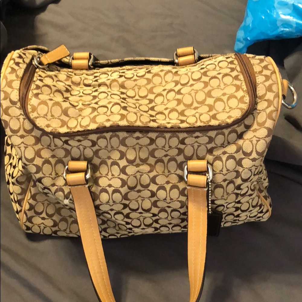 Beautiful Coach cosmetic bag with removable strap